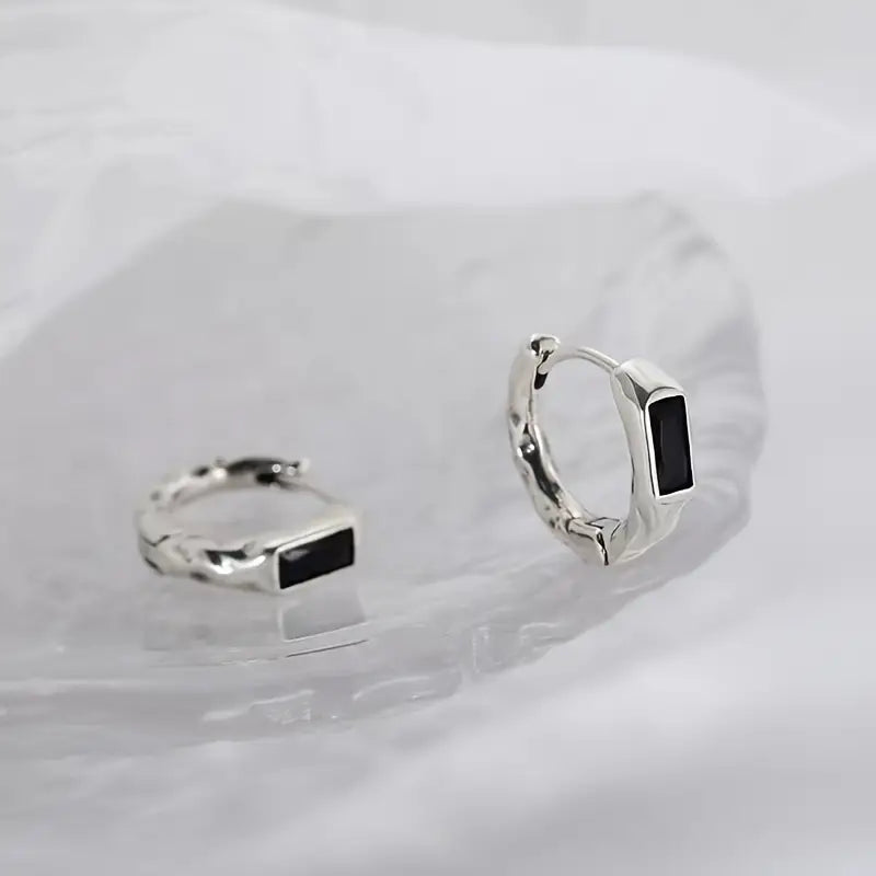 Aretes Corvus